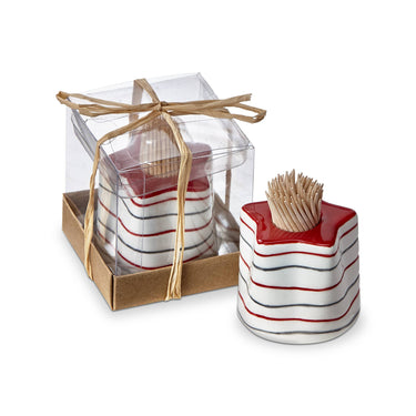 Striped ceramic container with toothpicks and a clear box on a white background