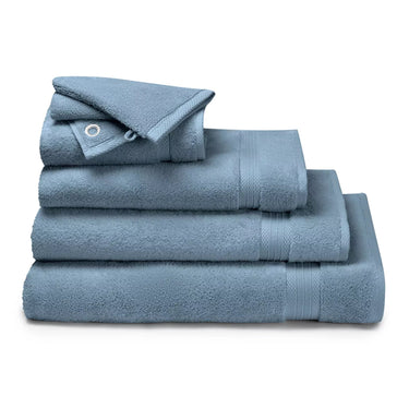Stack of Garnier Thiebaut Elea bath towels in Bleu Ardoise