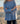 Mersea cable-knit Cotswold sweater in Misty Blue. One size, features a side-slit
