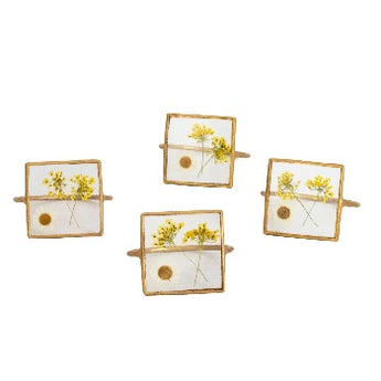 Brass square napkin ring with pressed flowers in center