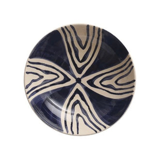 Blue and cream stoneware serving bowl with wavy pattern