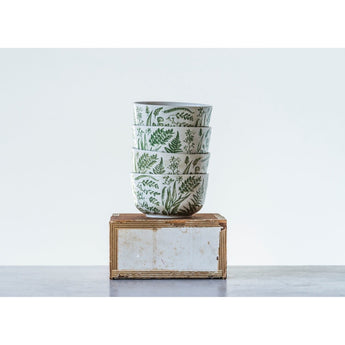 Green and cream stoneware bowl with fern pattern