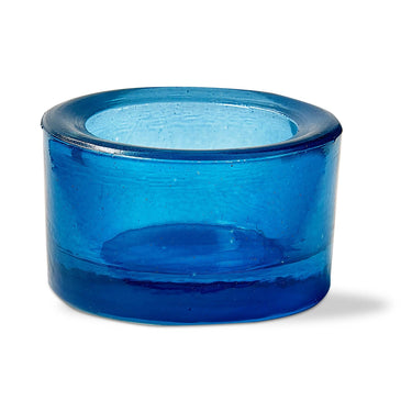 A blue chunky glass tealight holder crafted with traditional blown glass techniques.
