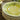 Lemon yellow plate with grey under-glaze. 