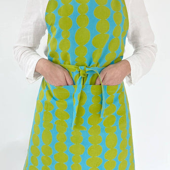 See Design Apron, Small Totem Aqua Citron. Available at Welcome Home Annapolis.
