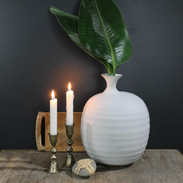 HomArt Haiku Brass Candle Holder Shown with lit candles
