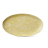 Yellow decorative plate with floral patterns on a white background