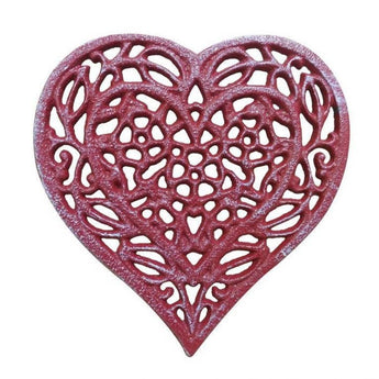 Red whitewashed cast iron trivet