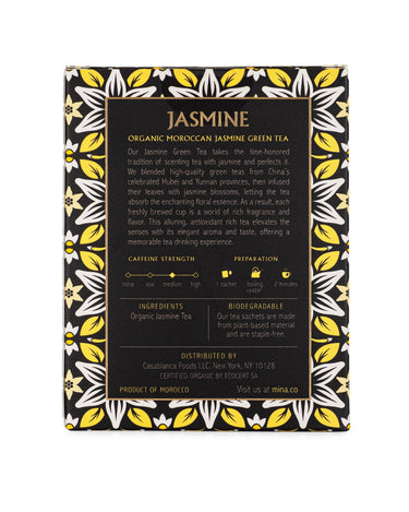 Tea package with black background and yellow floral patterns