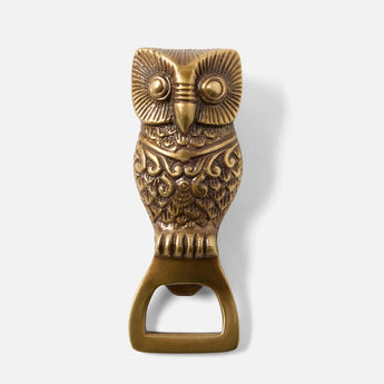 Metal bottle opener in the shape of an owl. Antique brass finish.