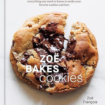 Cookbook with white background featuring a large image of a chocolate chunk cookie, slightly pulled apart showing melted gooey chocolate. Above the image it says “everything you need to know to make your favorite cookies and bars.” The title is in a white font and is overlayed on top of the cookie. Author’s name is bottom right, Zoë François.