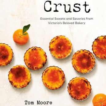 Book cover features light colored background with eight small tarts across the middle, and two oranges scattered throughout.