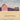 Cover art features a red barn surrounded by green trees in a field of wheat