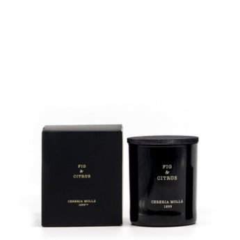 Candle and packaging, Black in color, with tan lettering with Company Logo & Fragrance.