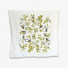 White tea towel with birds, leaves, and berries. On white background.