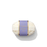 Bar of soap with a purple Floris label on a white background