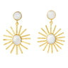 A pair of gold sunburst drop earrings with oval white mother-of-pearl stones, shown on a solid white background.