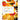 Front cover of the book 'Fundamentals of Flavor: 100 Recipes for the Science of Better Cooking' by Nik Sharma, featuring a white title block over an abstract food-art background with orange-yellow citrus slices and green leaves.