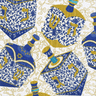 Blue and yellow dreidels on a gold and white background