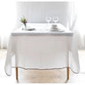 White linen tablecloth with natural border.