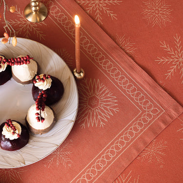 Ciel Etoile Red Collection Layered on table with holiday sweets
