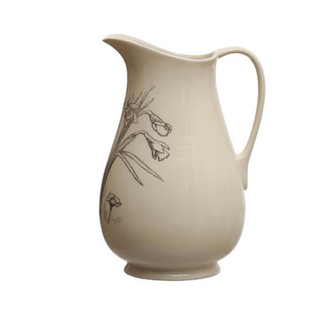 Profile of charcoal and white ceramic pitcher