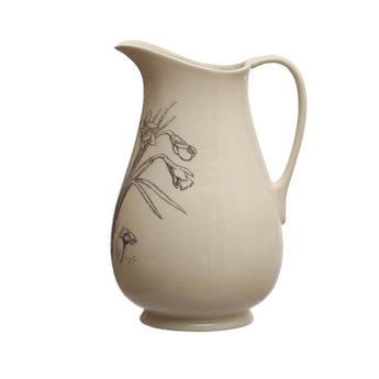 Profile of charcoal and white ceramic pitcher