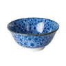 Blue floral patterned bowl on a white background