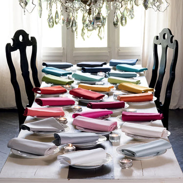 Table filled with napkins in different colors