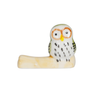Small owl figurine on a white background