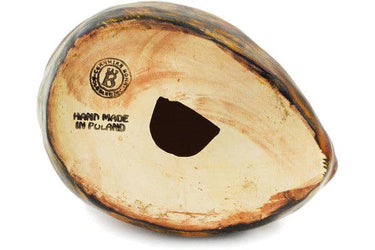 Bottom of duck with 'Hand Made in Poland' text on a white background