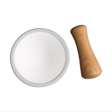White circular object with a wooden handle on a white background