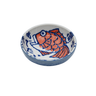 Ceramic bowl with a fish design on a white background