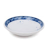 White ceramic bowl with blue wave pattern on a white background