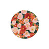 Seedlings holiday floral coaster features pink, crimson and tangerine colored flowers interspersed with greenery
