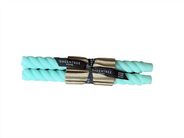 Robin’s egg blue colored beeswax taper candle pair with twisted texture