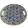 15” hand-made round ceramic presentation bowl featuring an arbor inlay design in cobalt blue. 