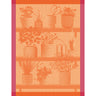 A beige tea towel with a floral and herbal design featuring various potted plants and gardening tools.
