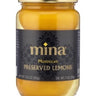 A jar of Mina Moroccan Preserved Lemons with the label visible, showing the product name and weight.